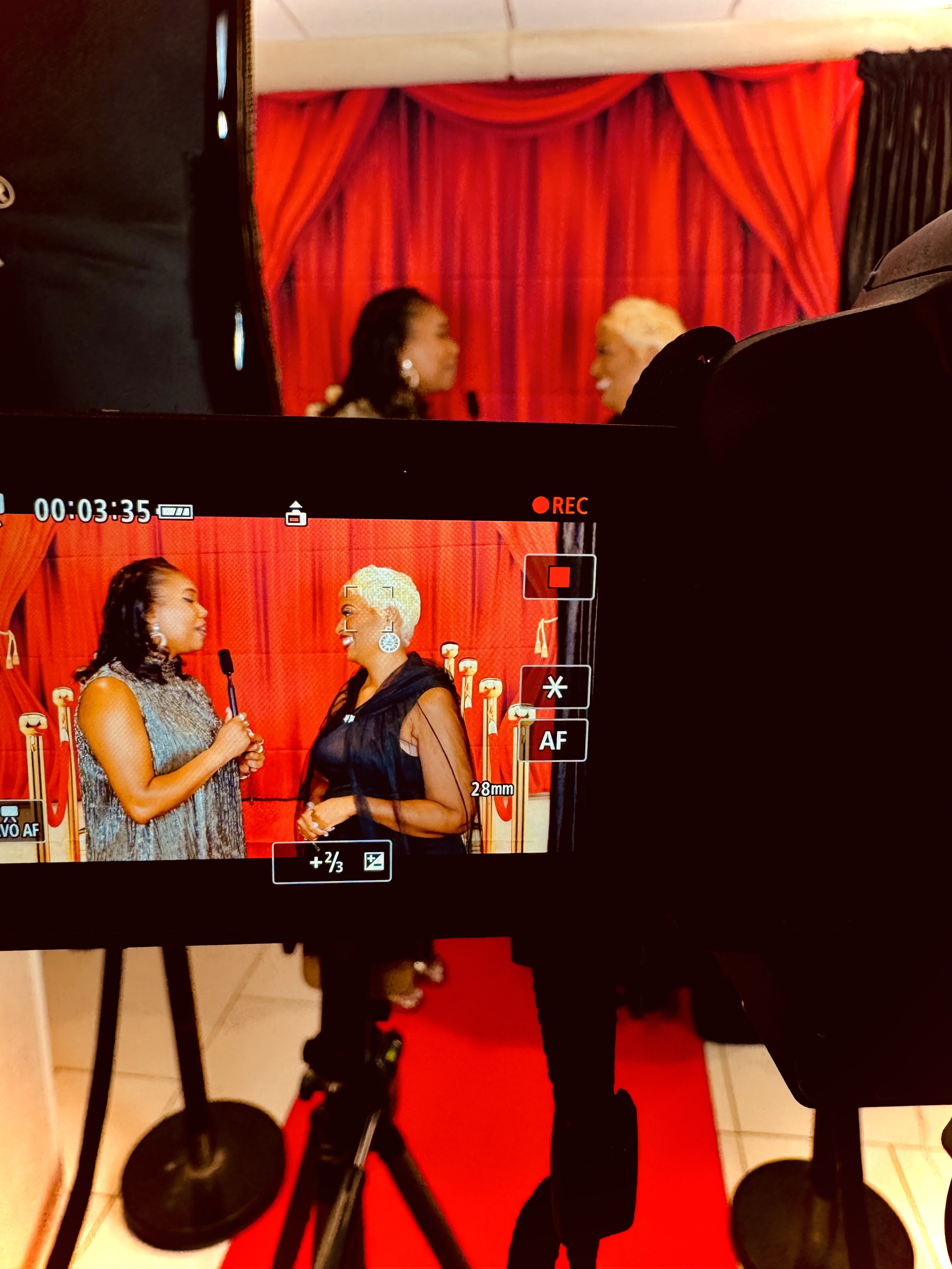Nikki B being filmed conducting a red carpet interview